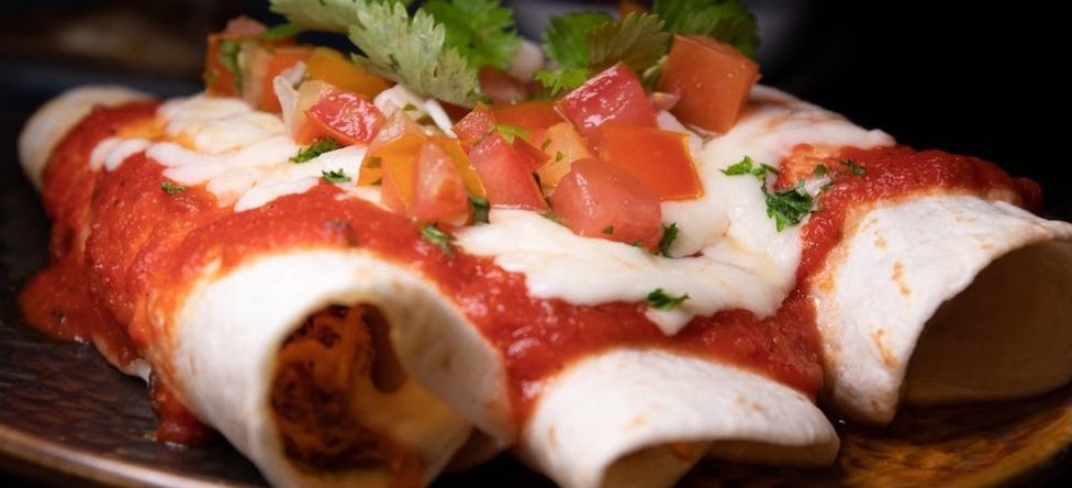 Gastronomía: Enchiladas de pollo a la Mexicana.